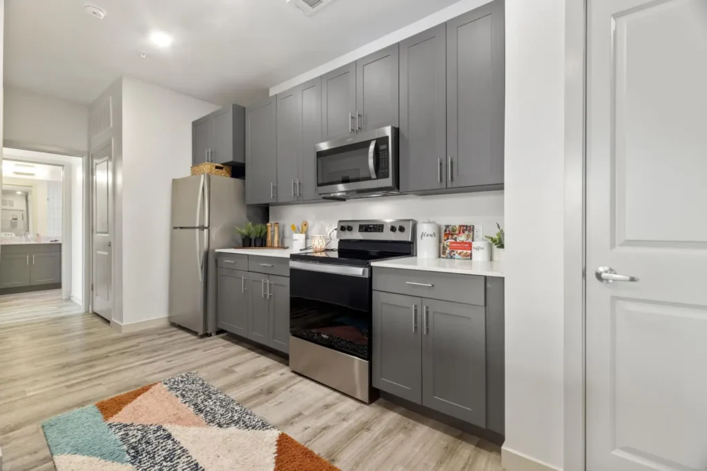 Spacious kitchen at 320 West Mag apartments near Auburn campus.